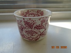 Unusual small measuring cup with 