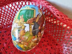 Flower-shaped wicker gift basket with paper mache egg