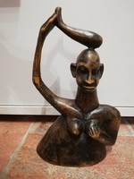Exotic-erotic wood carving sculpture