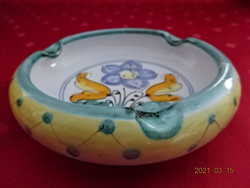 Hand-painted glazed ceramic ashtray, diameter 12 cm. He has!