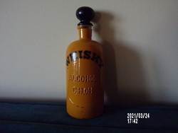 Very old whiskey bottle with vinyl stopper