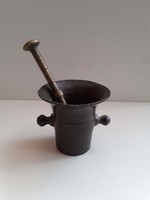 Old small copper mortar with pestle