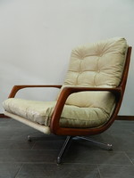 Original Scandinavian retro / mid century teak leather swivel armchair