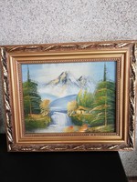 Oil on canvas landscape in ornate wooden frame