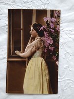 Antique hand colored romantic photo / postcard lady with organ in the window