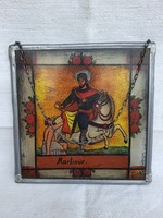 Martinus glass painted icon in tin frame.
