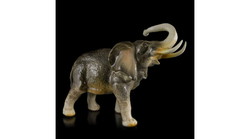 Old antique large elephant statue in porcelain display case