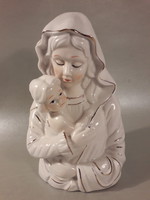 A porcelain statue of Mary painted with her little one