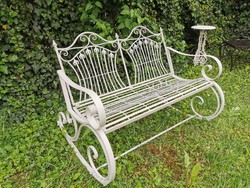 Wrought iron garden swing bench