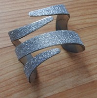 Silver colored shiny bracelet - bangle
