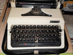 Erika írógép eredeti fekete bőr táskájában,papírjaival. 3000.-Ft