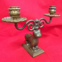 Pair of solid copper dog figural 2 arm candlesticks.