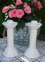 2 white candle holders