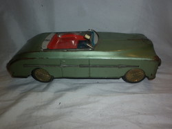 Old sheet metal flywheel packard record car toy car
