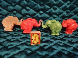 4 plastic elephants with retro traffic