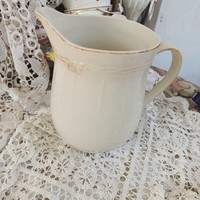 Thick-walled faience jug