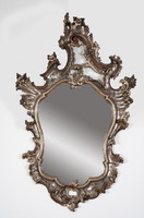 Mirror in a wooden frame. Hand carved silver ornaments. 150 years old.