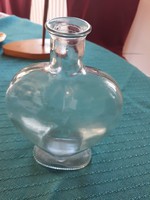 Thick glass bottle in heart shape