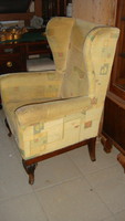 Armchair with handles to be renovated.