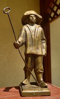 Bronze statue of small sculpture man