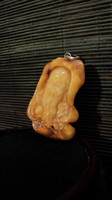 Honey amber pendant with Chinese wise carving
