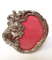 Oval metal picture holder with lady's head appliqué