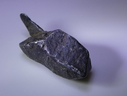 Kamacite version of gibeon iron meteorite piece from Namibia. 0.9 Grams.