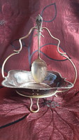 Old silvered table with spicy spoon