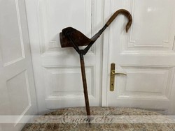 Antique hiking stick with folding leather seat