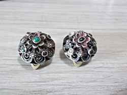 Filigree clip made of antique silver dandelion buttons