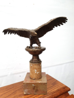 Antique turul - irredent symbol bronze statue on a marble plinth