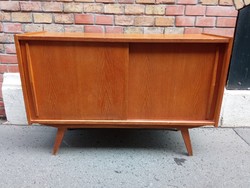Mid century design chest of drawers with sliding door