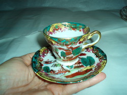 Vintage oriental coffee cup with plate