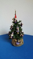 Small tabletop artificial tree with 16 purple wooden Christmas tree ornaments