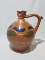 Old rattle water jug.