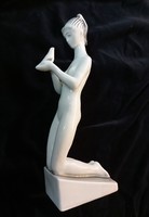 Porcelain woman with bird designed by John Zsolnay. 1950-60 As years ..