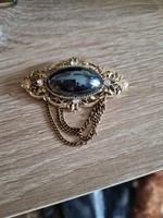 Old stony brooch