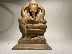 His royal majesty is the elephant. Straight from pumice, carved into a statue.