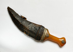 Yemeni jambiya dagger with amber handle.