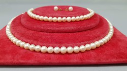 Genuine saltwater cultured pearl string set with gold clasp