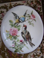 Decorative plate - wall decoration with colored gilded porcelain faience. Marked 