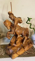 Wooden statue of St. George and the dragon