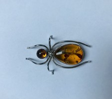 Large amber and silver spider brooch
