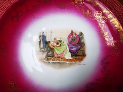 Antique plate decorated with a scene from the lear king
