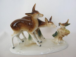 Porcelain deer porcelain with a pair of small birds