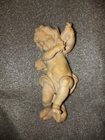 Carved wooden putto statue, approx. 14 cm, with injuries to his fingers.