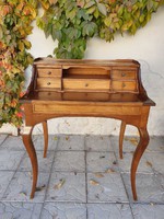 Stylish small desk in cherry wood with expandable writing pad