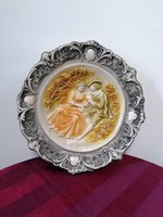 Romantic scene with plaster wall ornament plate