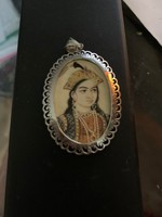 Indian lady painted on antique fang