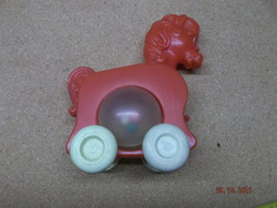 Old children's toy - pullable plastic horse --- 1 ---